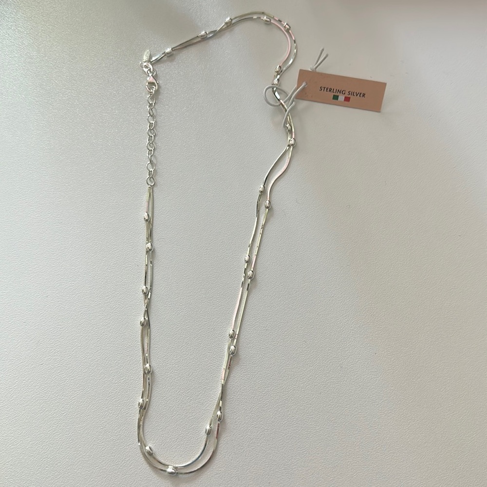 Brand new, never worn, silver choker necklace